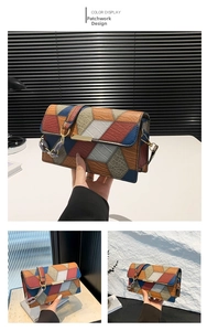 Detail of color-block patchwork shoulder bag with metal lock and textured leather panels