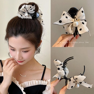 Elegant black polka dot bow hair claw clip with large pearl pendant for women's hairstyle