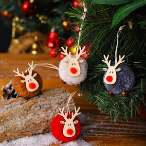 Set of four wool felt Christmas reindeer ornaments with wood heads for holiday tree decor