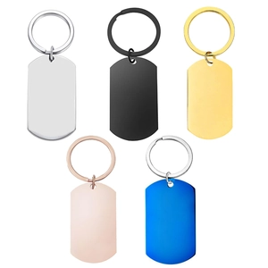Set of five polished stainless steel dog tag keychains in silver, gold, black, rose gold, and blue