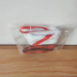 Classic red and black plaid Christmas stocking ornament with soft white plush trim