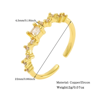 Detail of adjustable gold ring with white cubic zirconia inlay and 4.5mm center stone