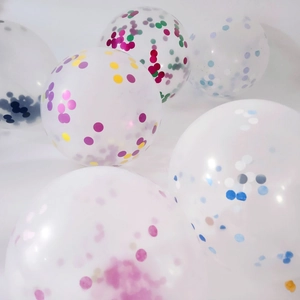 Detail shot of 12-inch clear balloons filled with vibrant colorful round paper confetti