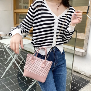 Pink printed lady handbag with geometric patterns and golden chain strap for women