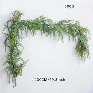 Detailed view of 180cm artificial cedar garland with green berries weighing 500g