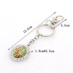 Religious silver keychain with Our Lady of Guadalupe charm and detailed size measurements