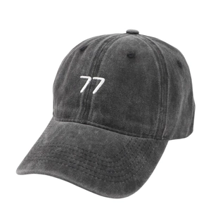 Washed dark gray vintage baseball cap featuring white 77 embroidery and curved brim