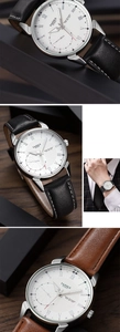 Detail view of quartz watch showing white dial, black and brown leather strap options