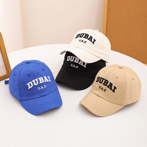 Set of 4 DUBAI cotton baseball caps for kids in blue, black, beige, and khaki colors