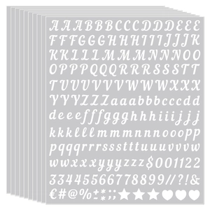 Stacked sheets of 0.5 inch white vinyl alphabet stickers with letters and numbers