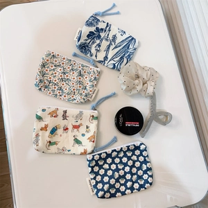 Set of four cotton floral mini zipper pouches with blue lanyards for small item storage