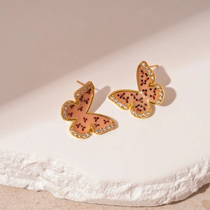 Pink enamel butterfly earrings with gold plating and sparkling zircon crystal edges