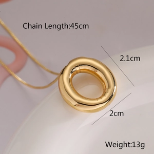 Detail of golden ring pendant necklace with size specs: 45cm chain and 2.1cm diameter