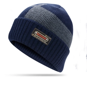 Winter knit beanie and neck warmer set in navy blue and grey with leather patch detail