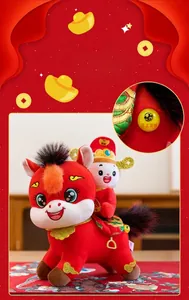 Detail view of a 2026 Year of the Horse plush toy with intricate gold embroidery.