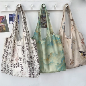 Detail of three aesthetic canvas tote bags with traditional Chinese art and calligraphy