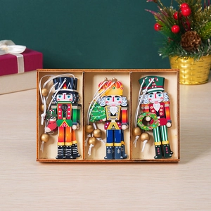 Three-piece set of wooden Nutcracker soldier ornaments in a decorative gift box