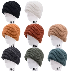 Vertical rib knit beanies for men and women available in 8 classic colors for winter warmth