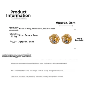 Detailed view of floral stud earrings featuring gold alloy, rhinestones, and pearls