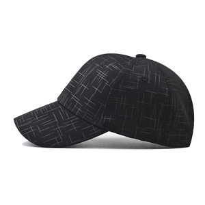 Minimalist black baseball cap with gray grid pattern and curved brim in side view