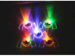 Close-up of five colorful LED glowing mouthpieces in red green blue orange and white