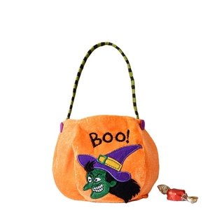 Halloween pumpkin candy bag with green witch embroidery and striped handle for kids