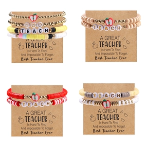 Colorful Heishi clay beaded teacher bracelet set with TEACH letters and apple charms