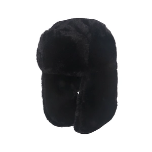 Winter black faux fur Ushanka hat with warm ear flaps for outdoor thermal protection
