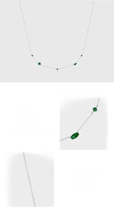 Detail of S925 sterling silver necklace featuring hand-set green cubic zirconia stones