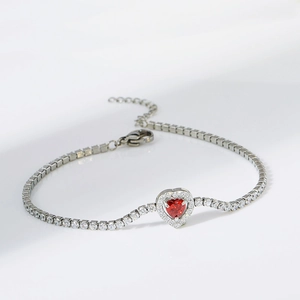 Silver stainless steel tennis bracelet featuring a red heart-shaped zircon centerpiece