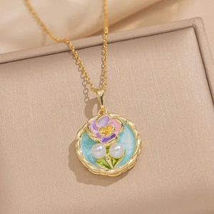 Baroque enamel flower pendant with freshwater pearls on a gold-plated vintage necklace