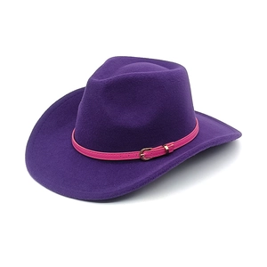 Detail of purple western cowboy felt hat with vibrant pink leather band and metal buckle