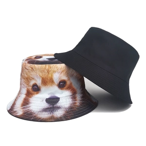 Reversible red panda print and plain black bucket hat made of durable twill cotton