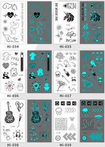 Luminous temporary tattoos showing blue glow effects with snake and butterfly designs