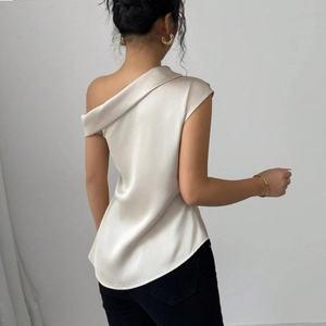Elegant champagne satin one-shoulder sleeveless top with a slim fit back view detail