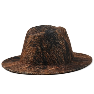 Faux fur fedora hat with brown and black animal print texture and wide brim