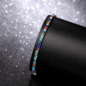 Close-up of 2mm rainbow crystal elastic bracelet with colorful rhinestones on display