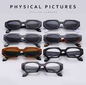 Collection of seven polygon sunglasses in black, tortoiseshell, and transparent frames