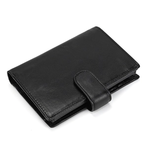 Detail view of the black genuine leather wallet showing side thickness and strap closure