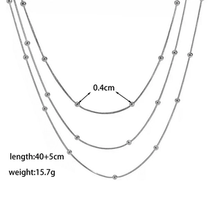Triple layer stainless steel beaded necklace with 40+5cm length and silver finish
