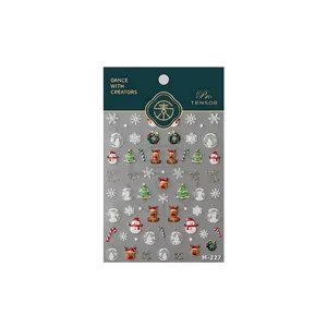 Christmas nail art stickers M-227 featuring reindeer, snowman, and snowflake patterns