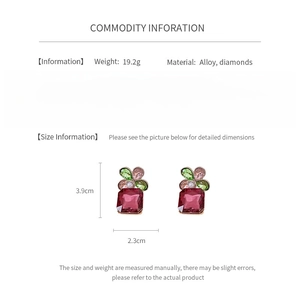 Detail showing vintage flower earrings dimensions 3.9cm by 2.3cm with pink and green gems