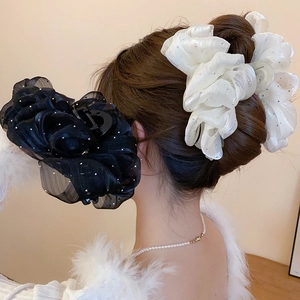 Detailed back view of elegant oversized mesh bow hair claw clips with sparkling accents
