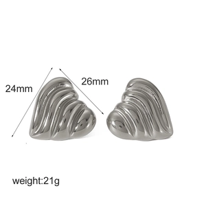 Polished 18k gold heart-shaped textured earrings measuring 24mm by 26mm weighing 21g