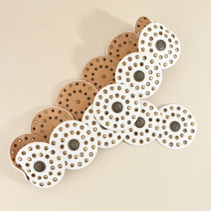 Detailed close-up of retro PU suede belts featuring vintage bronze rivets and studs