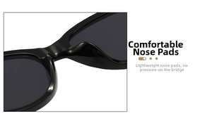 Detail of lightweight integrated nose pads on black oval cat-eye sunglasses for comfort