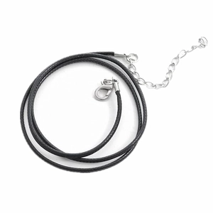Detail of black braided leather necklace cord with silver lobster clasp and extension chain