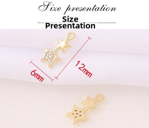 Detailed view of gold star pendant size 12mm x 6mm with sparkling zircon stones