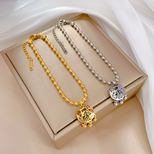 Gold and silver stainless steel beaded bracelets with traditional Fu lock pendants
