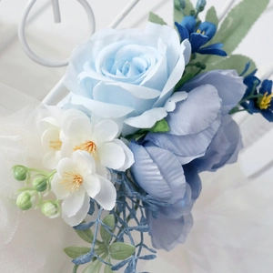 Elegant artificial wedding flower corsage with blue roses and lace for bridal decoration